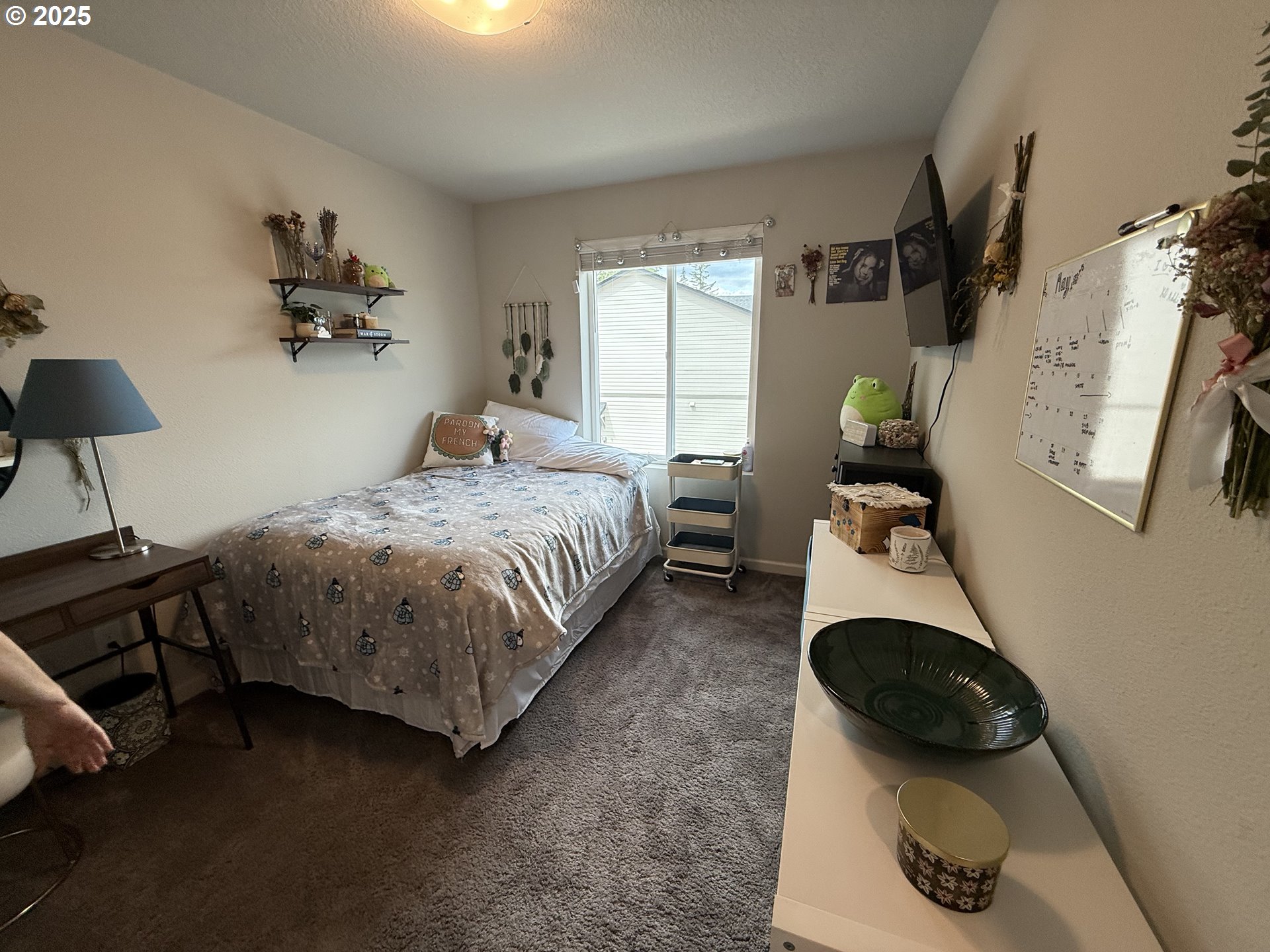 4135 South Canyon View Circle Ridgefield, WA 98642 - Photo 18 of 25 a bedroom with a bed and a window