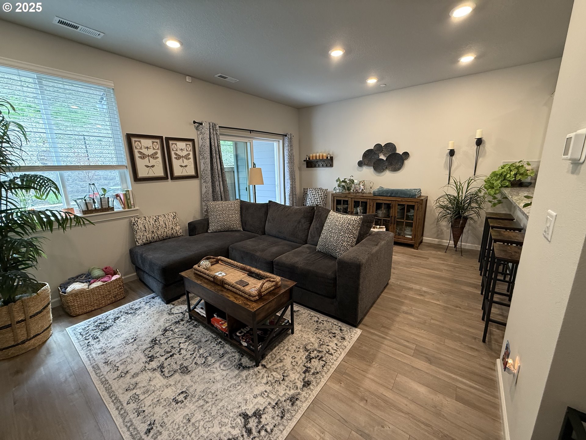 4135 South Canyon View Circle Ridgefield, WA 98642 - Photo 3 of 25 a living room with furniture a rug and a window