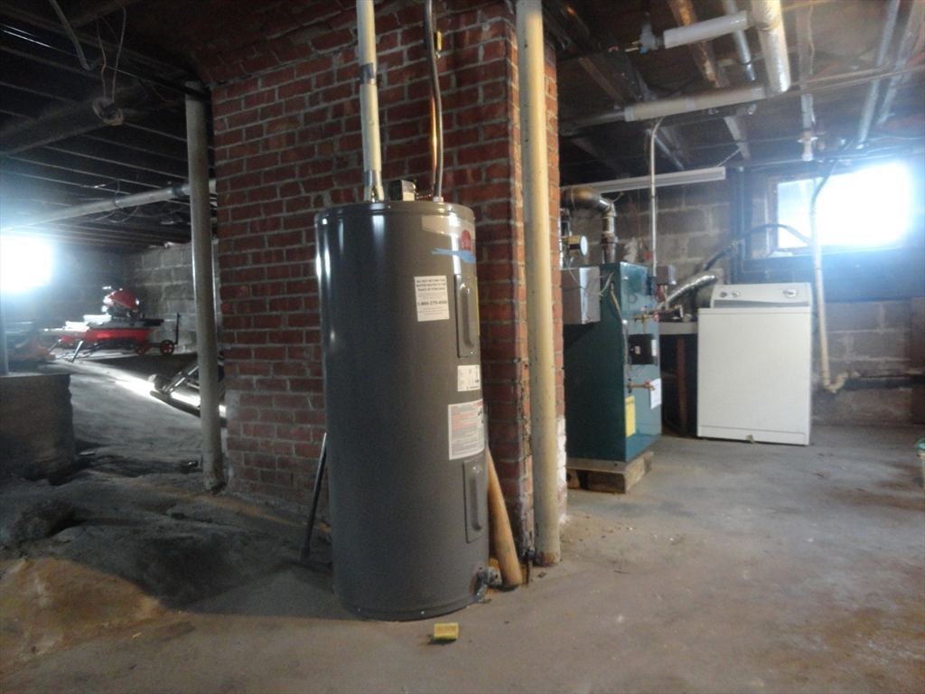 14 Rowe Hill Road Stoneham, MA 02180 - Photo 27 of 30 a view of water heater room