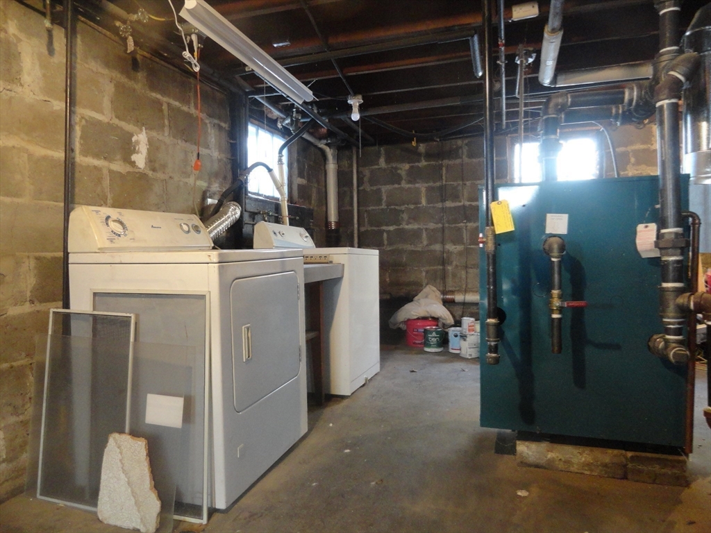 14 Rowe Hill Road Stoneham, MA 02180 - Photo 28 of 30 a utility room with dryer and washer