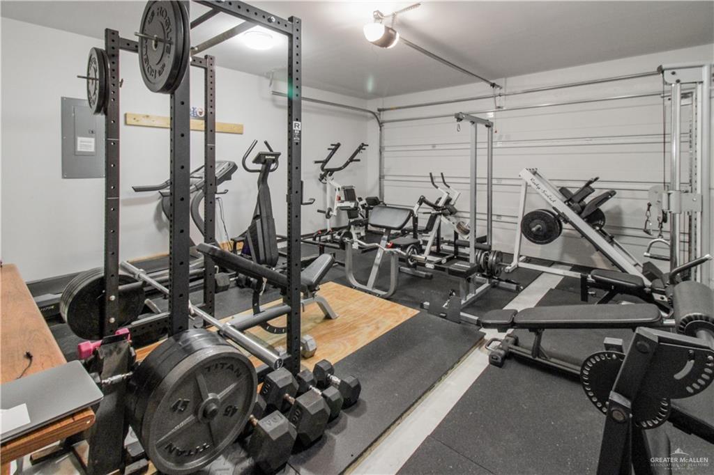 1900 Queens Avenue McAllen, TX 78504 - Photo 22 of 23 a view of a room with gym equipment