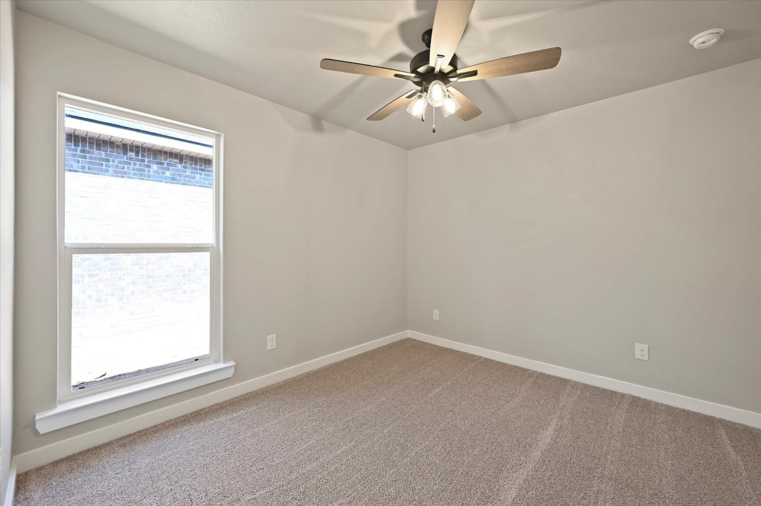 3706 Urbana Place Lubbock, TX 79407 - Photo 16 of 22 an empty room with a window