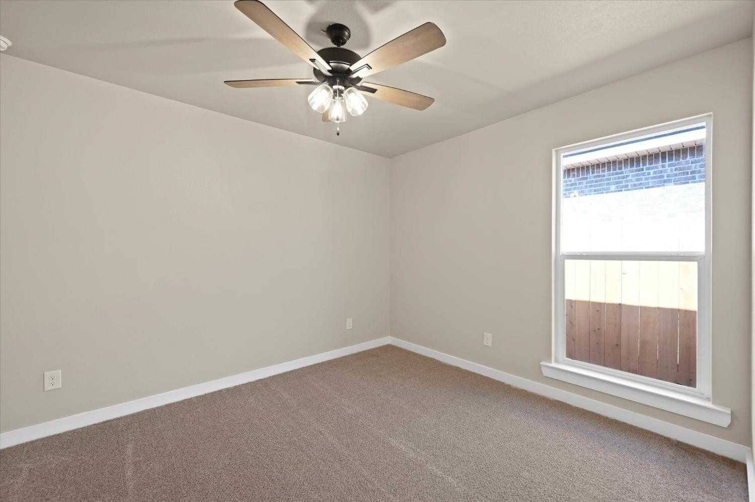 3706 Urbana Place Lubbock, TX 79407 - Photo 18 of 22 an empty room with a window