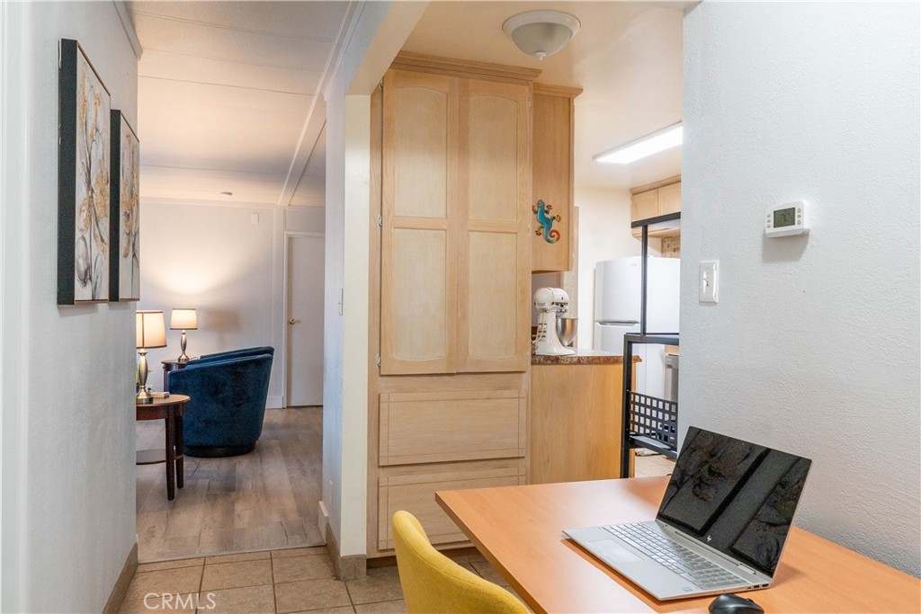 251 South Colorado River Road, Unit 38 Blythe, CA 92225 - Photo 16 of 19 a view of kitchen with furniture and a refrigerator