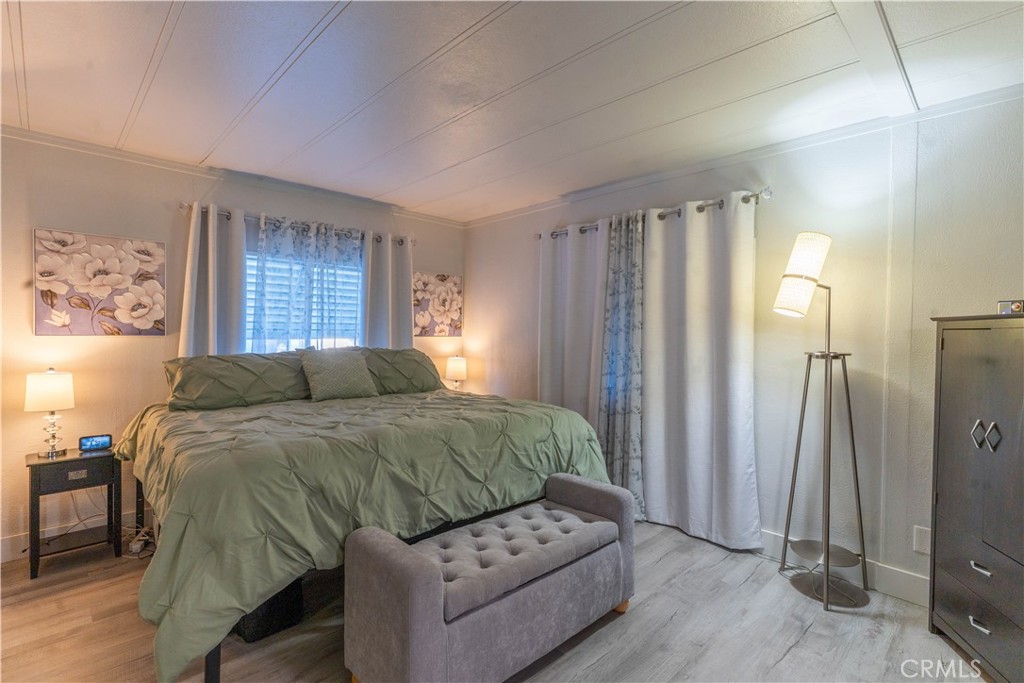 251 South Colorado River Road, Unit 38 Blythe, CA 92225 - Photo 6 of 19 a living room with furniture and a large window