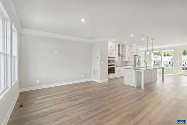 a view of kitchen with wooden floor