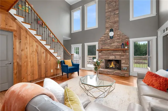 a bathroom with a tub and shower