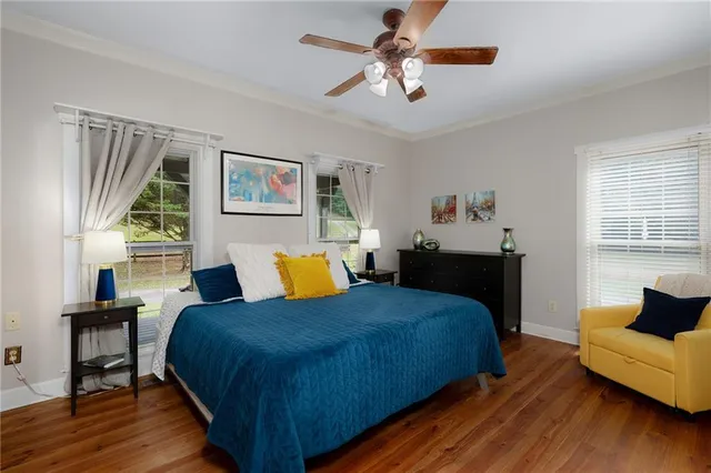 a view of a livingroom with furniture and a flat screen tv