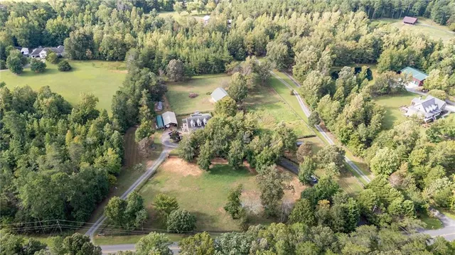 a view of a lake with a house