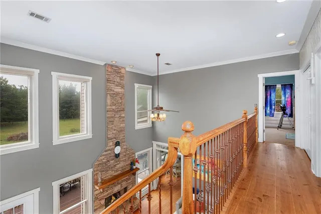 a view of a room with wooden walls
