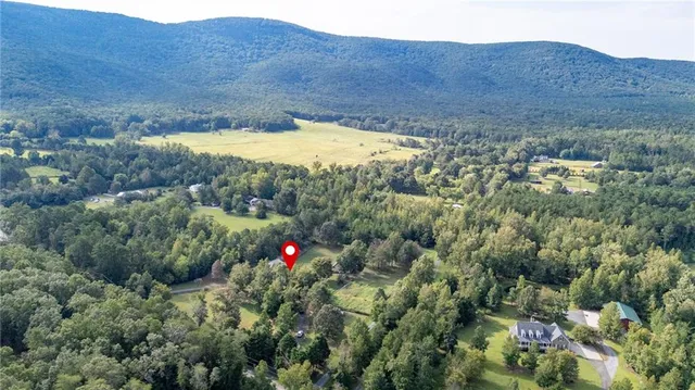 a view of a lush green mountain