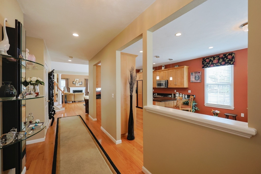 14 Codding Road, Unit 65 Norton, MA 02766 - Photo 3 of 30 a view of a living room with a large window