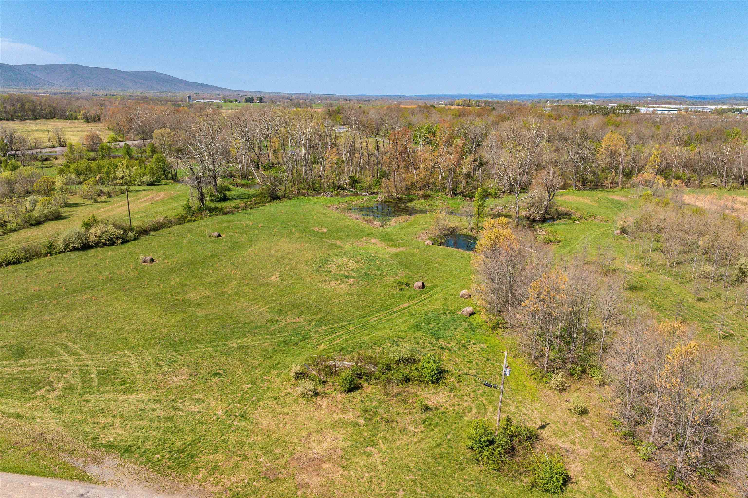 514 Lipscomb Road Stuarts Draft, VA 24477 - Photo 23 of 38 a view of lake view and mountain
