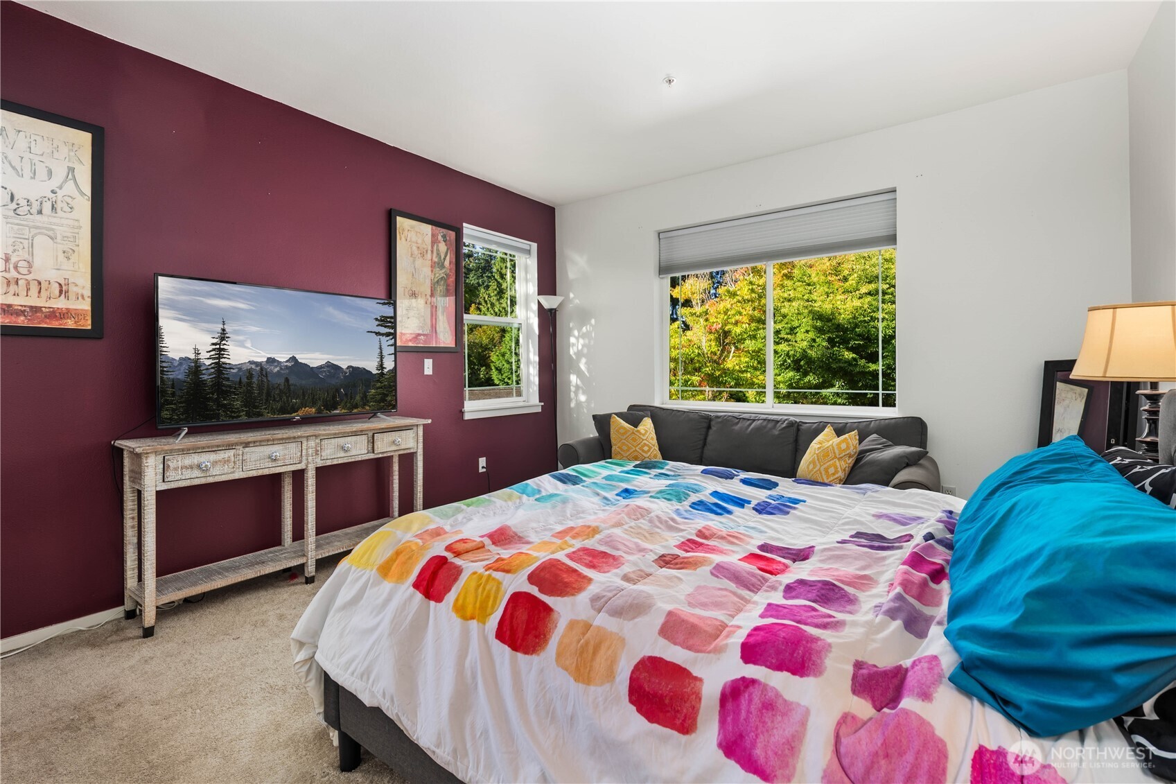 107 164th Street Southeast, Unit 2301 Bothell, WA 98012 - Photo 23 of 35 a bedroom with a bed and a flat screen tv