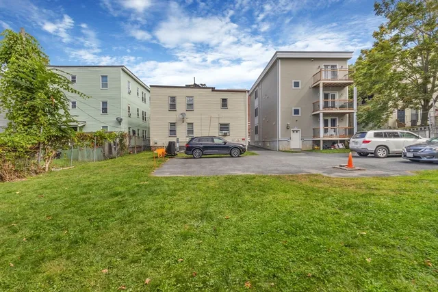 a view of yard in front of building