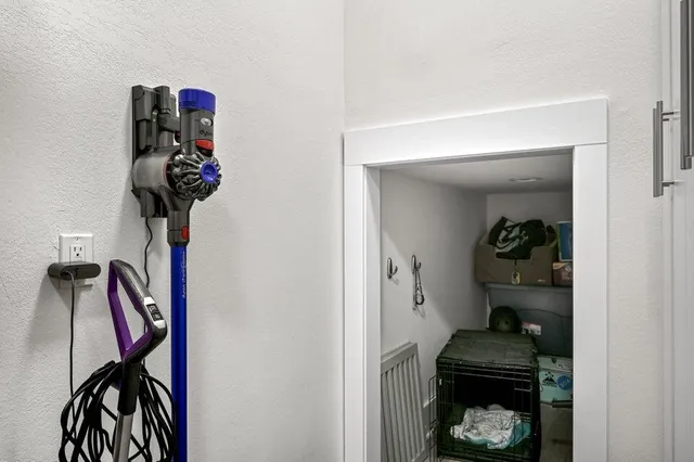 a view of a chairs and table in patio