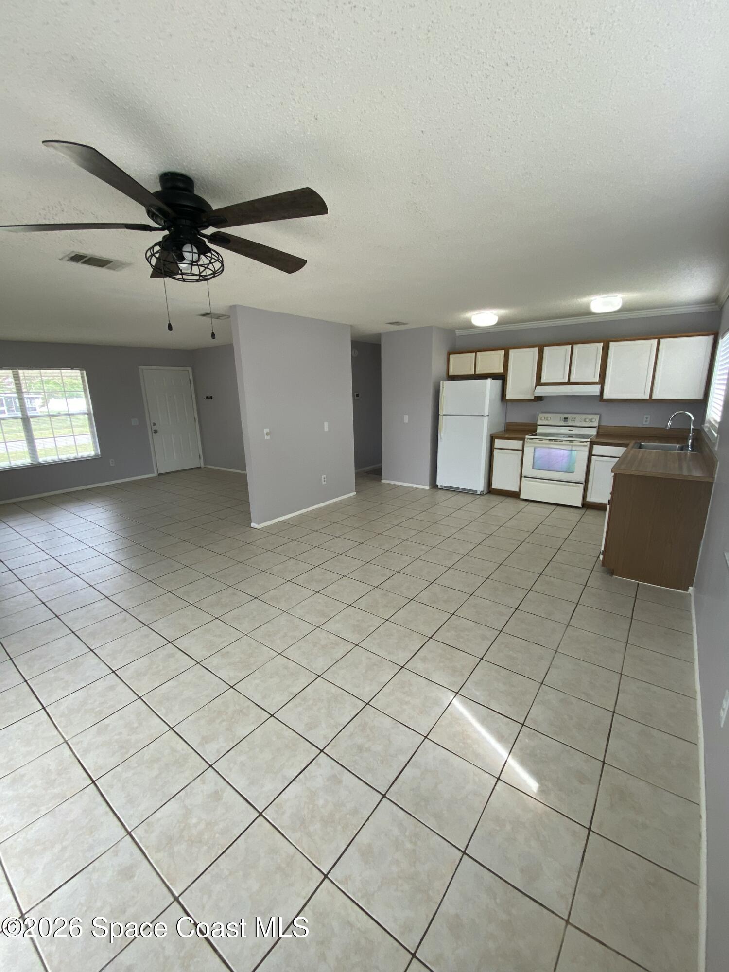 1264 Dawn Street Northeast Palm Bay, FL 32905 - Photo 10 of 14 IMG_20260513_145420 (2)