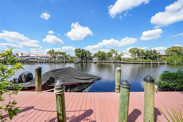 a view of a lake with sitting area
