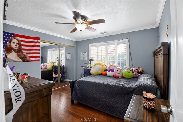 a bedroom with furniture and a bed