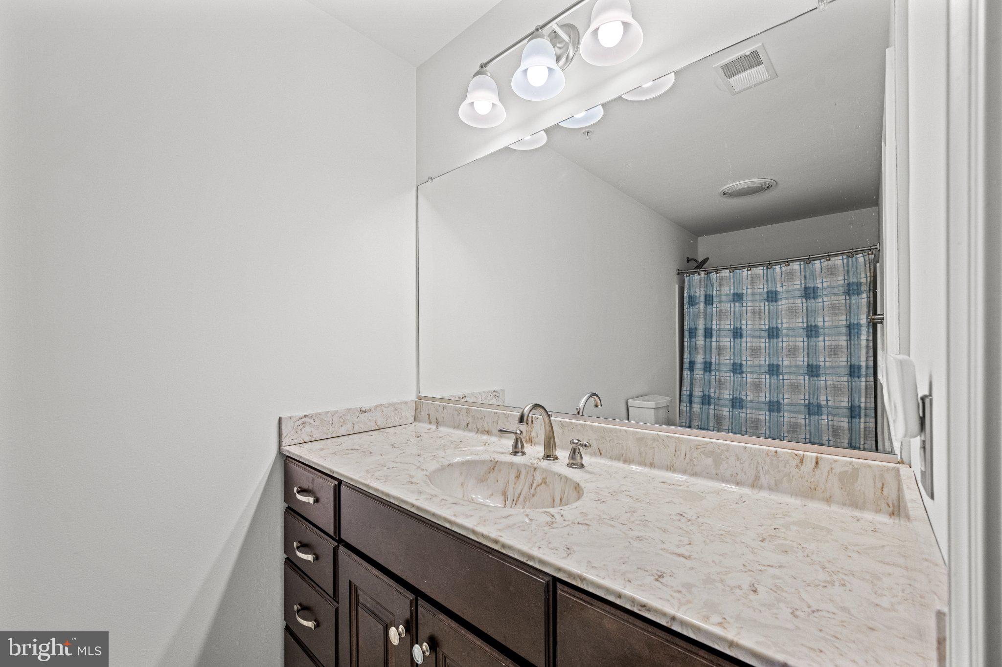10693 Harding Road Laurel, MD 20723 - Photo 36 of 55 Full bathroom off of Bed 2