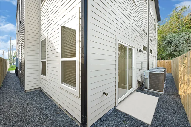 a view of a back yard of the house