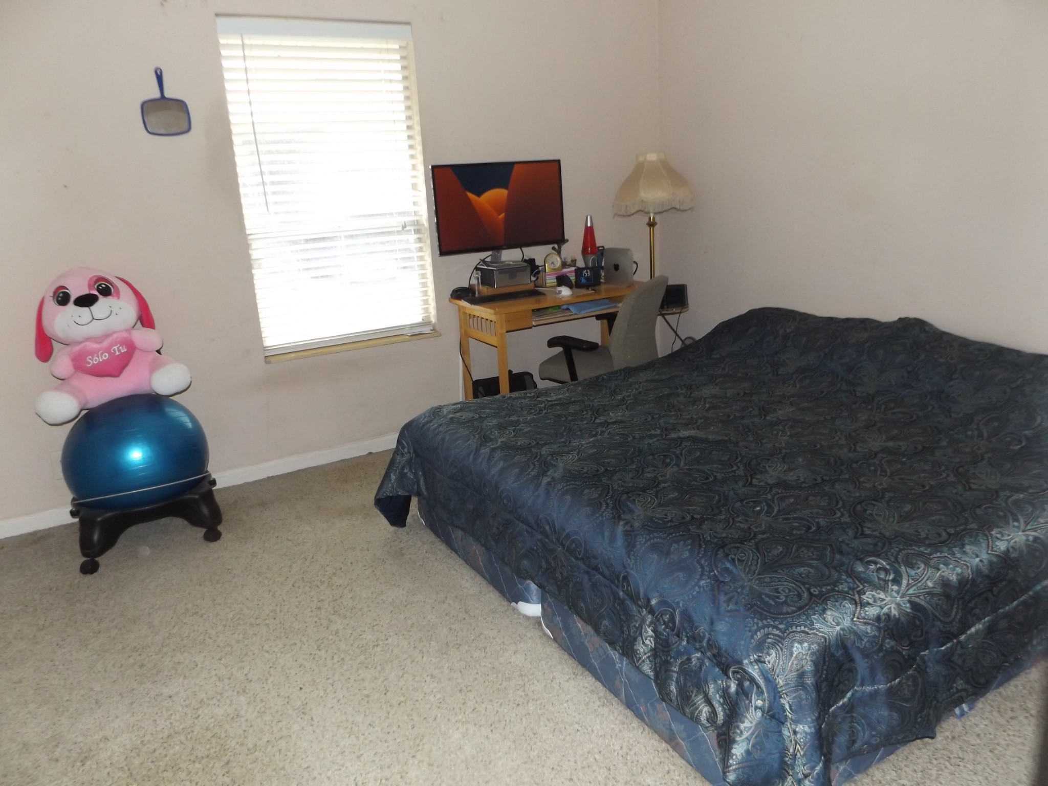 500 Paragon Mills Road, Unit N5 Nashville, TN 37211 - Photo 10 of 12 a bedroom with a bed and a window