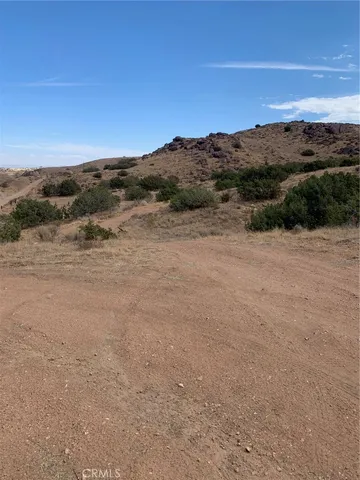 a view of an outdoor space with mountain view
