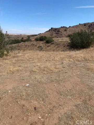 a view of ocean and mountain