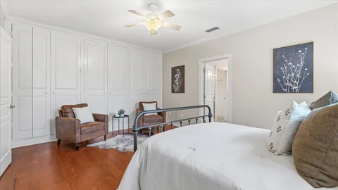 a room with furniture and wooden floor