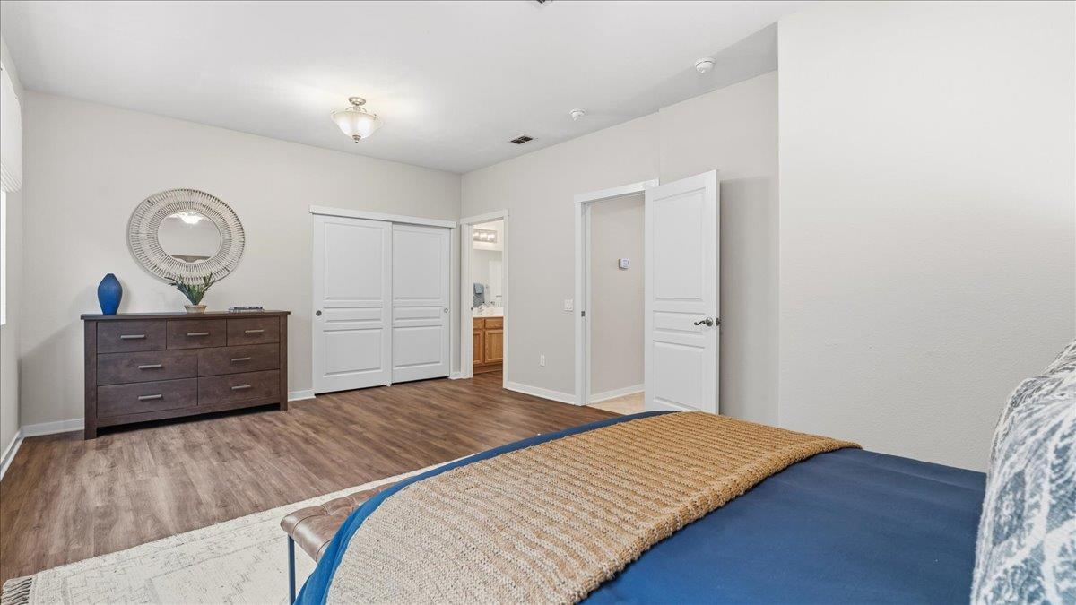 1181 Segolily Lane Lincoln, CA 95648 - Photo 22 of 31 a bedroom with a bed and a dresser
