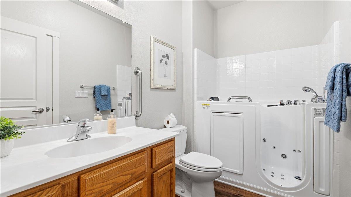 1181 Segolily Lane Lincoln, CA 95648 - Photo 23 of 31 a bathroom with a sink toilet a shower and a mirror
