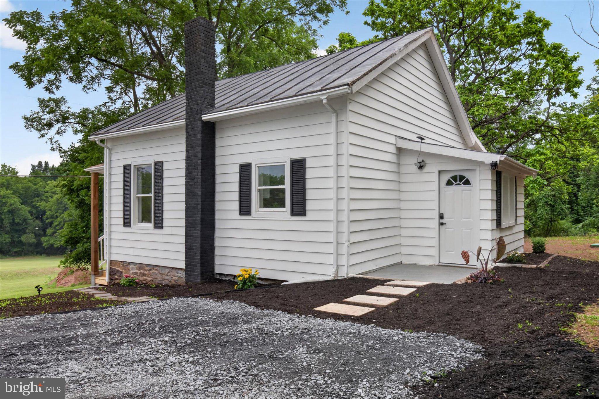 140 Creek Road Shermans Dale, PA 17090 - Photo 32 of 36 Charming cottage with lush surroundings.