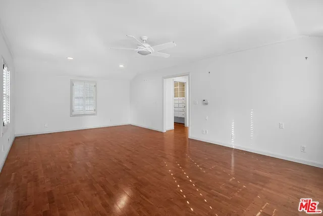 a view of storage and utility room with washer and dryer