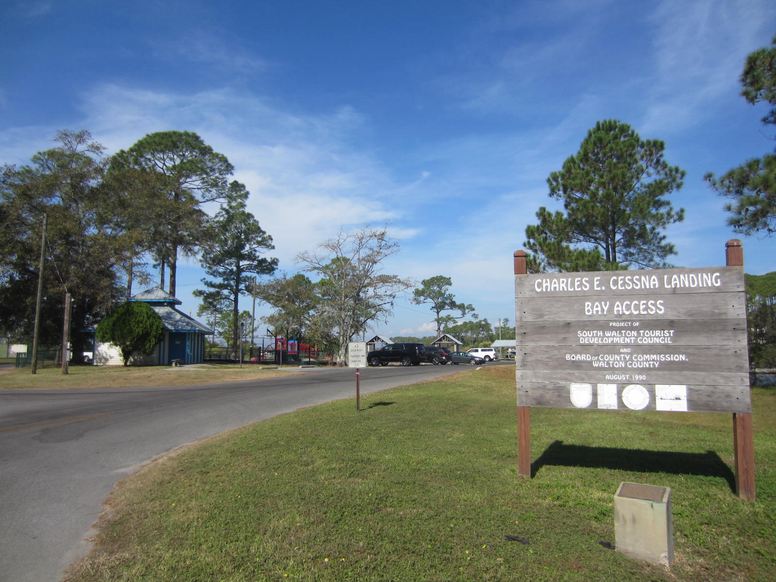 69 West Nursery Road Santa Rosa Beach, FL 32459 - Photo 2 of 6 a sign board with a play ground in front of it