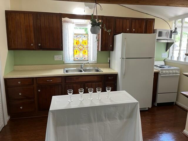271 10th Street Lancaster, OH 43130 - Photo 5 of 18 Electric stove & refrigerator included. Beautiful stain glass hanging for window