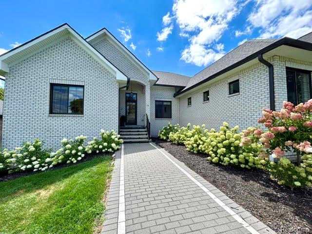 39 Stark Road Rochester, MI 48307 - Photo 3 of 70 Brick paver front walk and beautiful Hydrangea landscaping along walkway