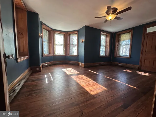 a view of livingroom with hardwood floor and window