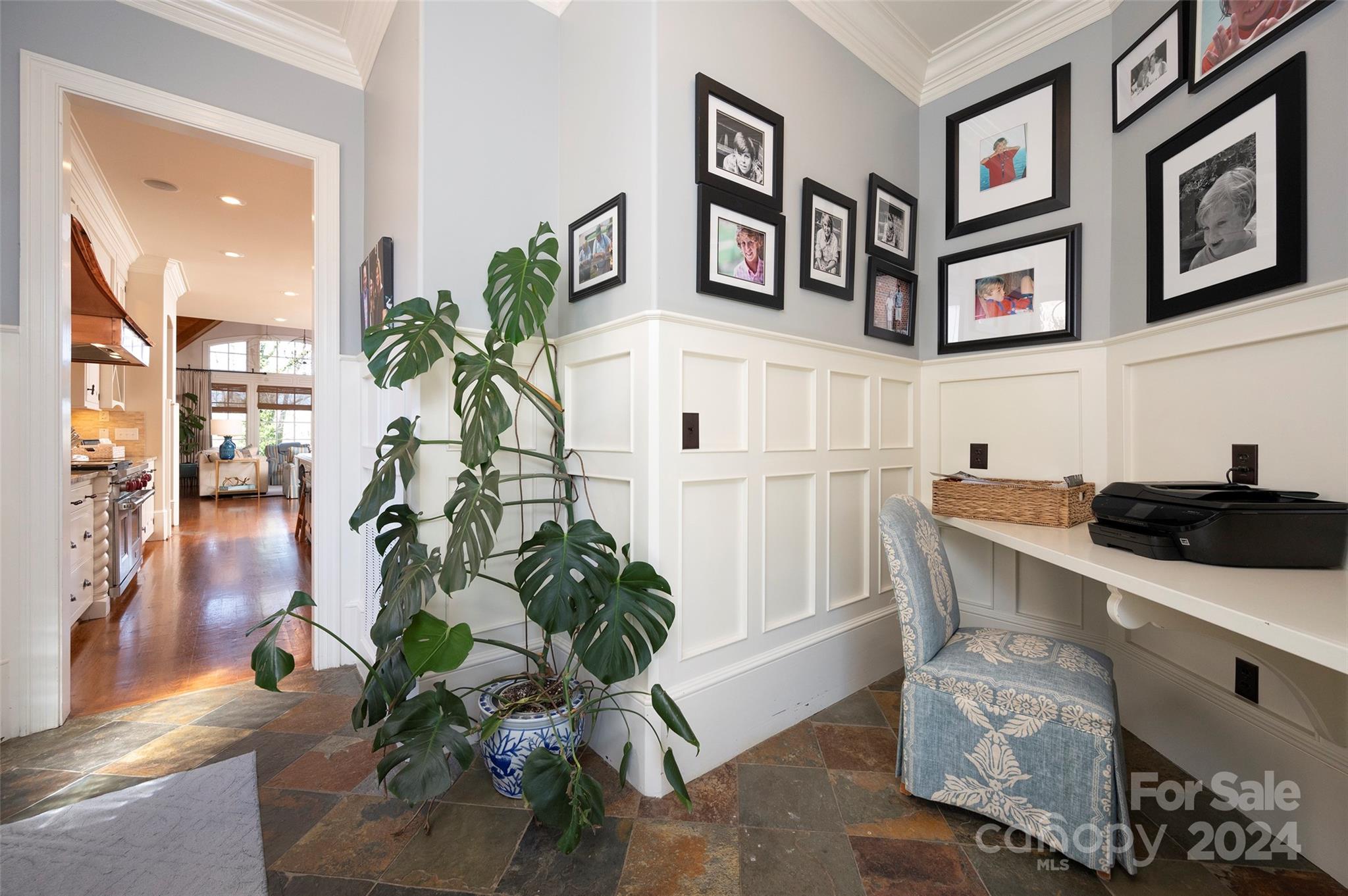 287 James Way Advance, NC 27006 - Photo 11 of 45 a living room with furniture a potted plant and wooden floor