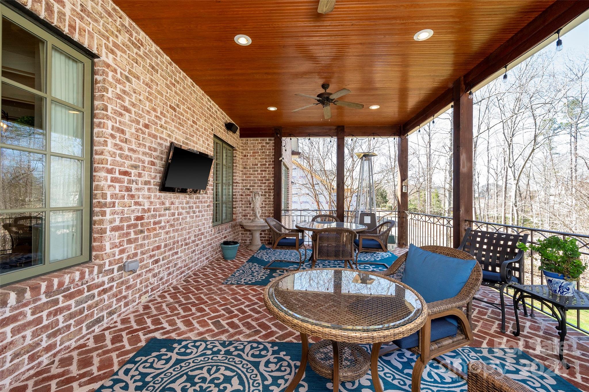 287 James Way Advance, NC 27006 - Photo 38 of 45 a living room with patio furniture and a fireplace