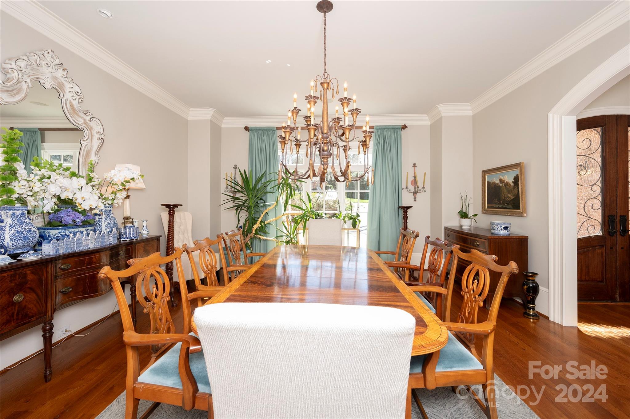 287 James Way Advance, NC 27006 - Photo 5 of 45 a view of a dining room with furniture a chandelier and wooden floor