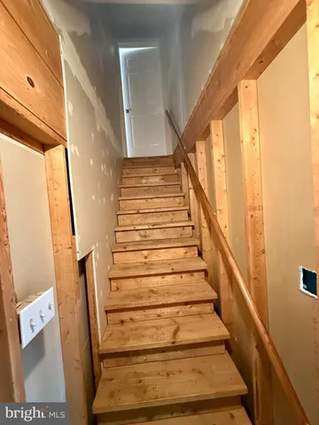 a living room with furniture a dining table and a piano table
