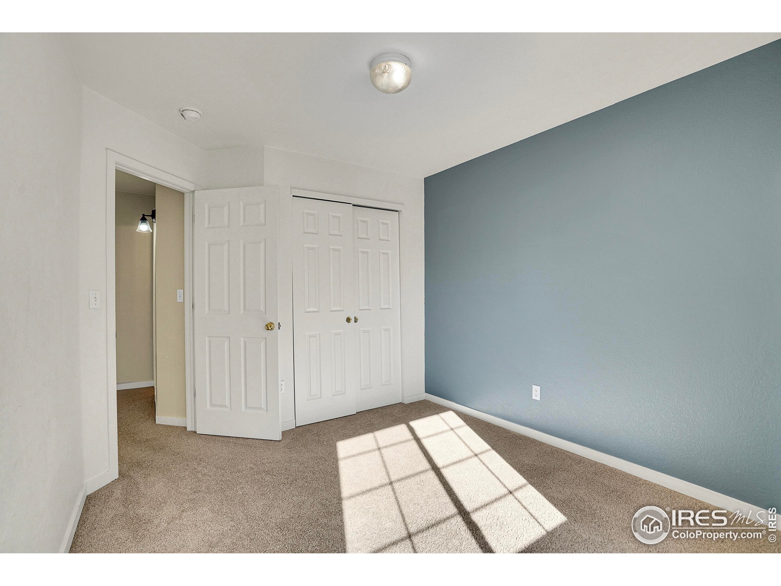 2408 Concord Circle Lafayette, CO 80026 - Photo 23 of 49 a view of an empty room and window