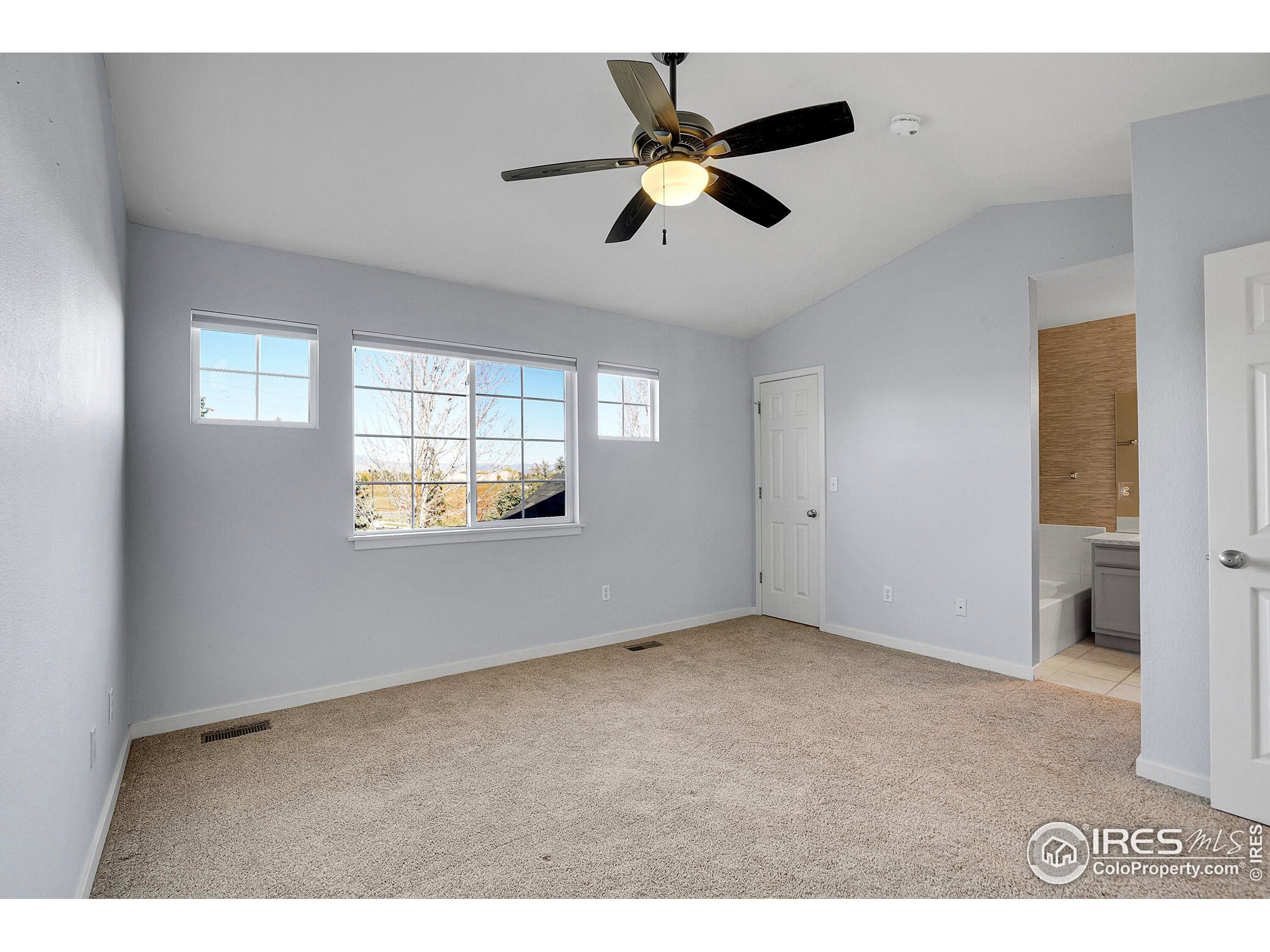 2408 Concord Circle Lafayette, CO 80026 - Photo 27 of 49 a view of an empty room with a window