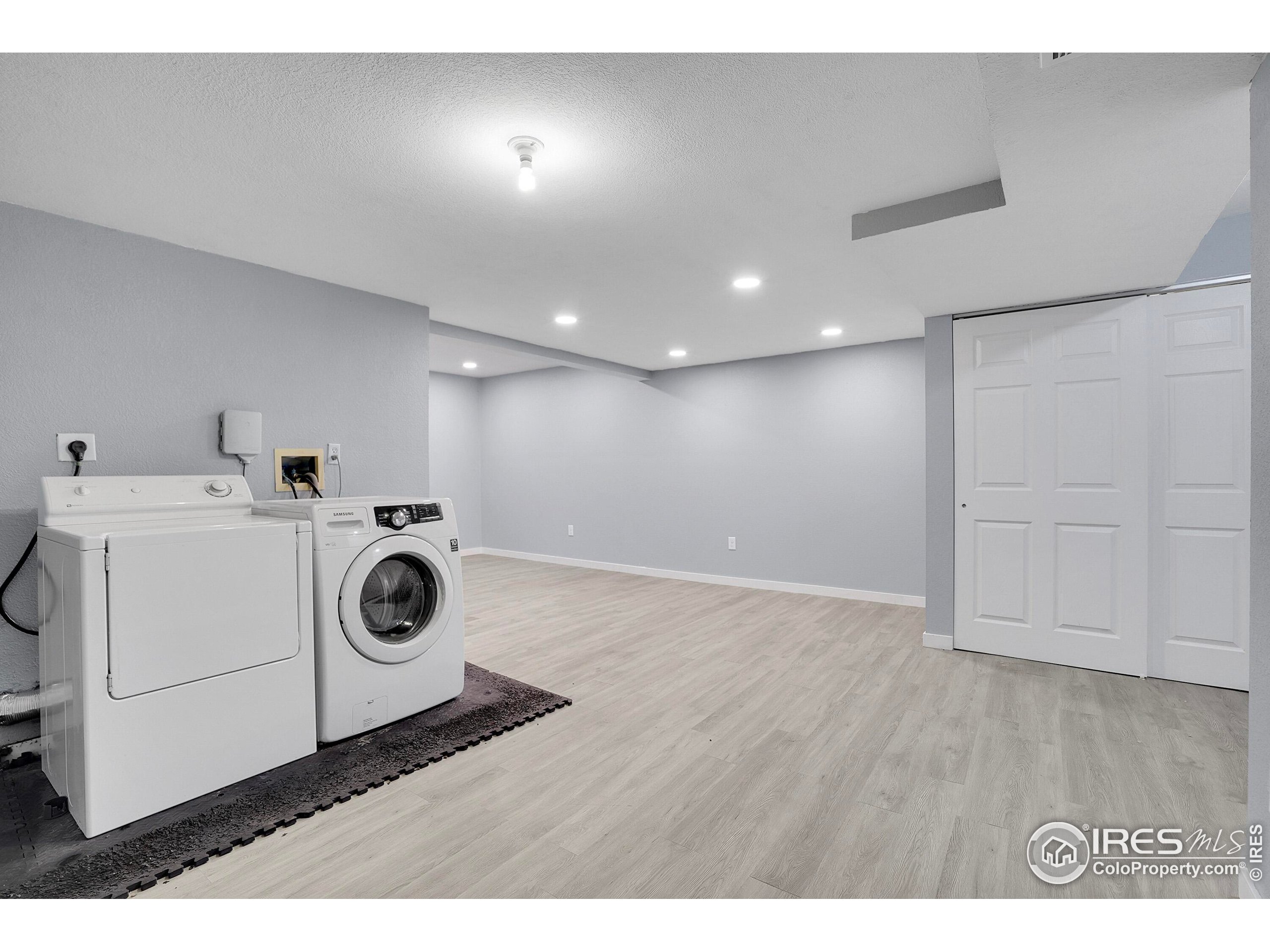 2408 Concord Circle Lafayette, CO 80026 - Photo 35 of 49 a view of a storage & utility room with washer and dryer