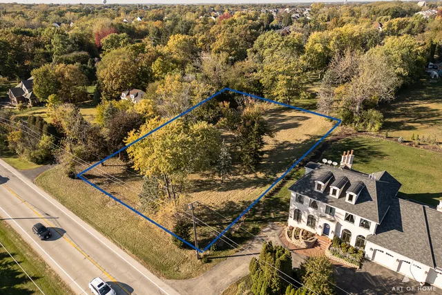 a view of balcony with wooden floor
