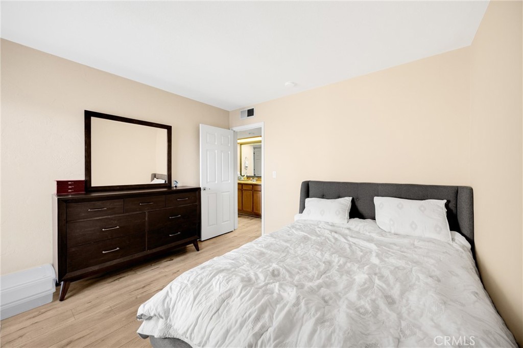 1410 West Lambert Road, Unit 202 La Habra, CA 90631 - Photo 20 of 30 a bedroom with a bed and a window