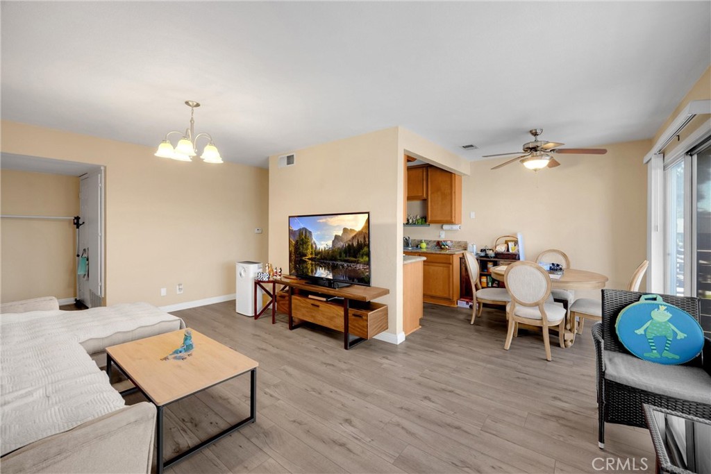 1410 West Lambert Road, Unit 202 La Habra, CA 90631 - Photo 4 of 30 a living room with furniture and a flat screen tv