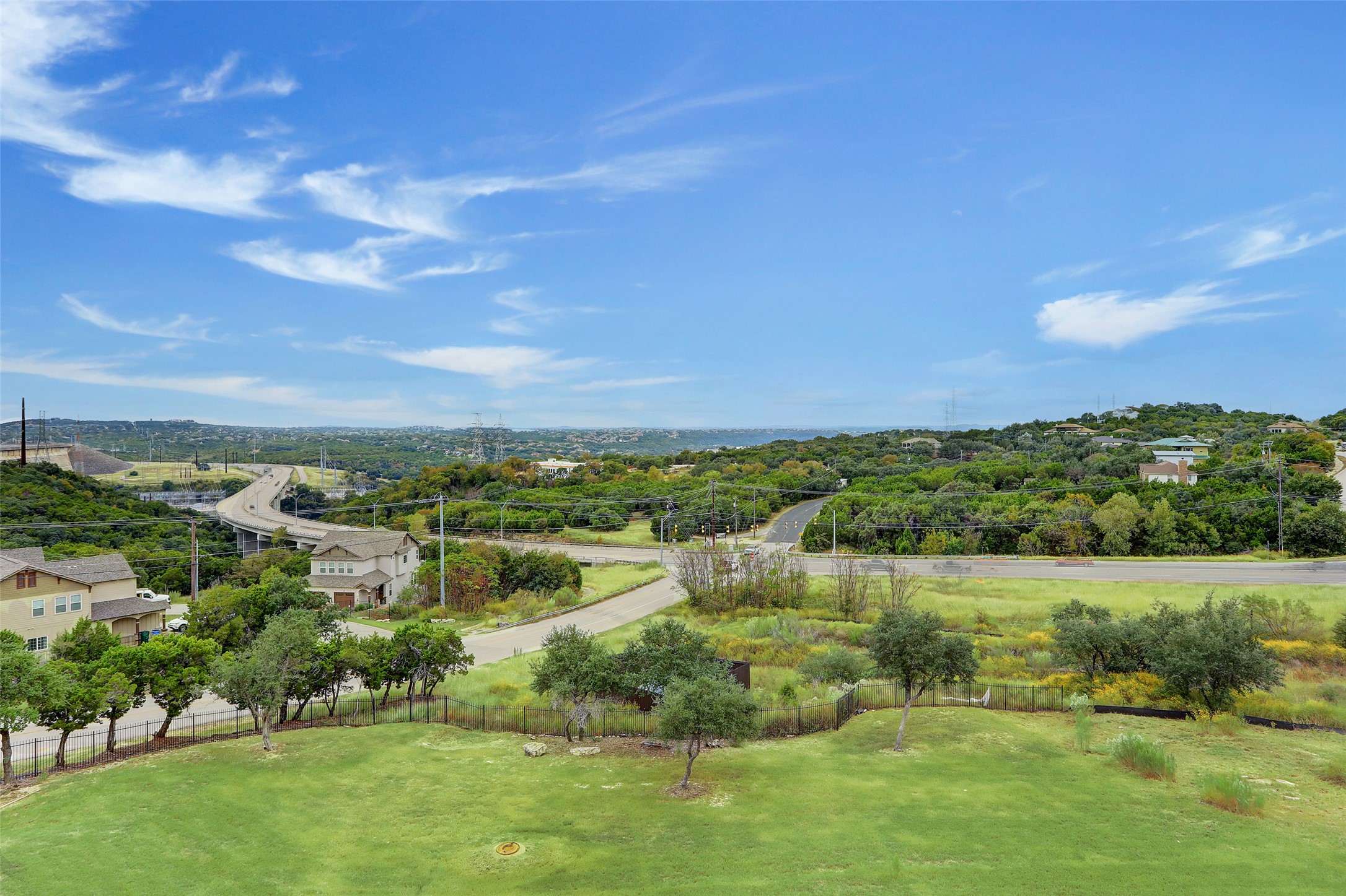 4300 Mansfield Dam Road, Unit 1521 / 1531 Austin, TX 78734 - Photo 1 of 31 a view of lake with houses