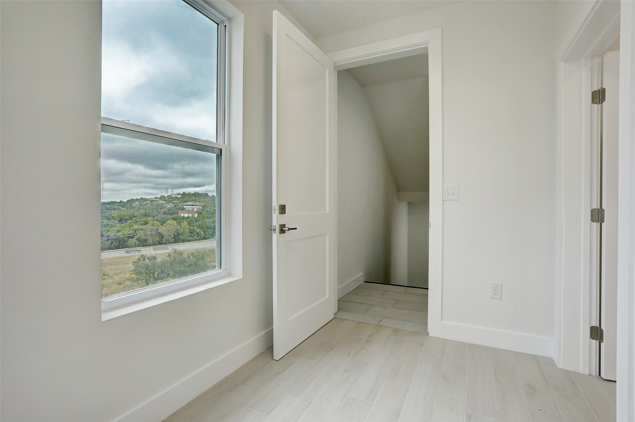 4300 Mansfield Dam Road, Unit 1521 / 1531 Austin, TX 78734 - Photo 14 of 31 a view of an empty room with a window