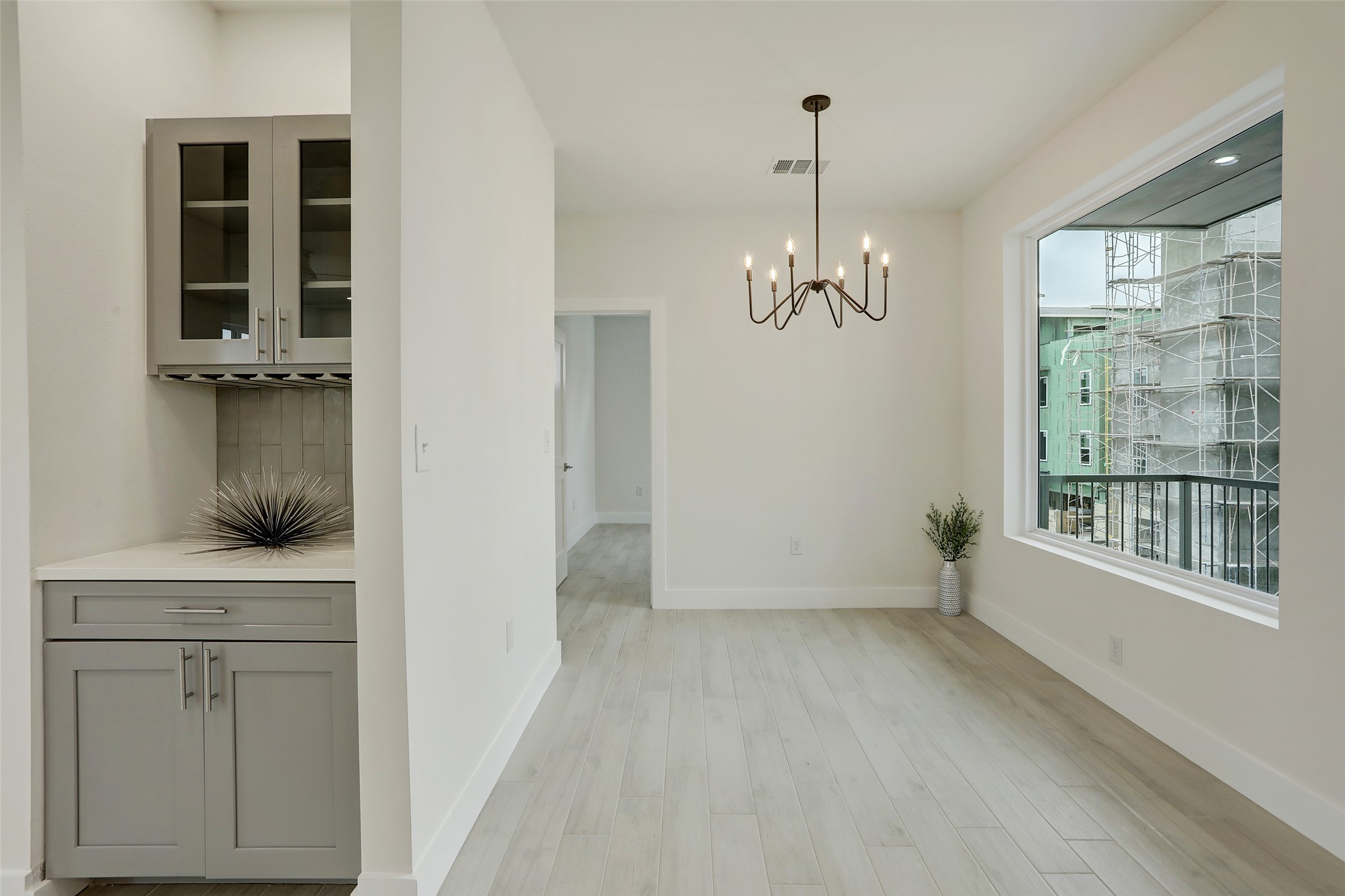 4300 Mansfield Dam Road, Unit 1521 / 1531 Austin, TX 78734 - Photo 4 of 31 a view of a room with wooden floor and windows